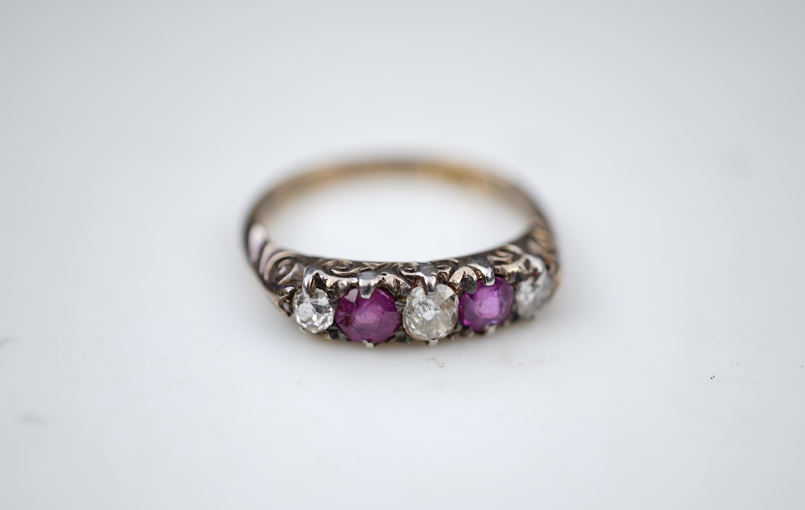 A pink sapphire and diamond ring, early 20th century